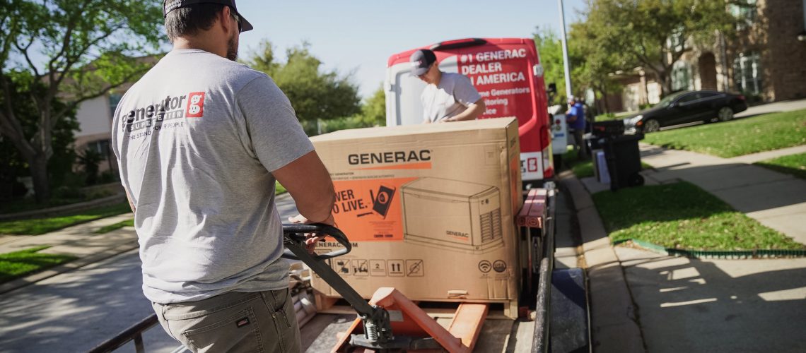 generac generator being unloaded by two generac generator of St. Louis employees