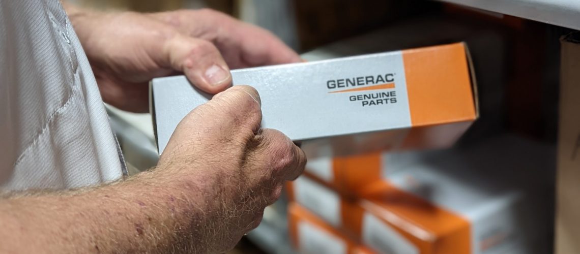 generac genuine part in a man's hand
