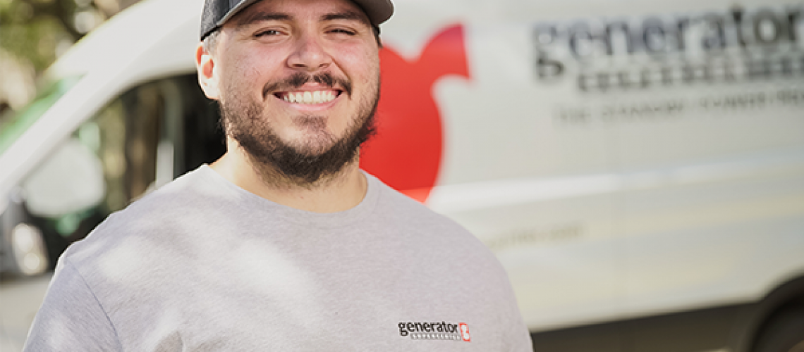 generator supercenter technician standing next to a generator supercenter service van